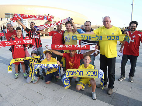 גם בצהוב וגם באדום, כולם באו לראות חגיגת כדורגל (אלן שיבר)