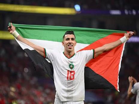 אל יאמיק ודגל פלסטין