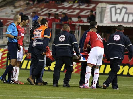 האדומים לא רגועים מהפציעה של בוזגלו (צילום: אלן שיבר)