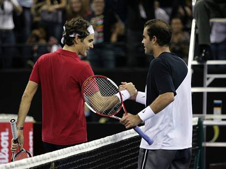 קיבל את השרביט, והציל את הטניס. פדרר (Photo by Ricky Chung/South China Morning Post via Getty Images)