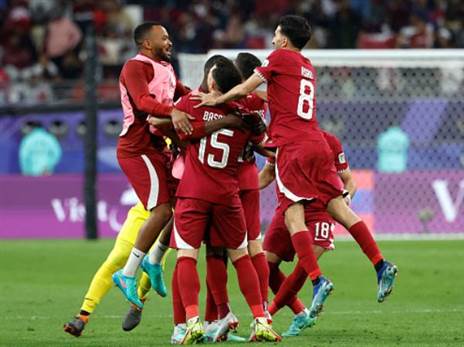 שחקני קטאר חוגגים (GETTY)