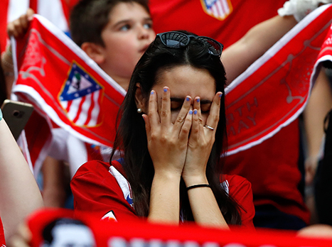 אוהדת אתלטיקו התקשתה לעכל את השער המהיר של ריאל (gettyimages)