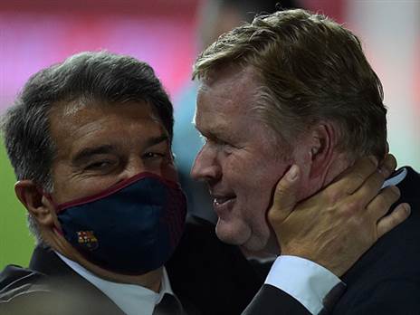 רונלד קומאן וז'ואן לאפורטה. היחסים בין השניים היו רעועים במיוחד (GETTY)