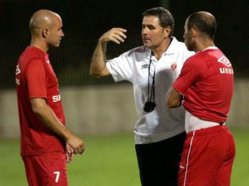 לצד אלי גוטמן. “המאמן הטוב ביותר שהיה לי“