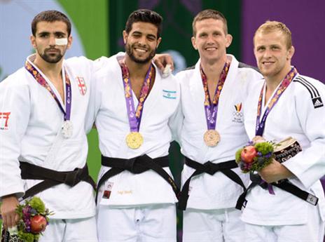 על הפודיום (צילום: הוועד האולימפי)