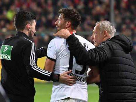 "גיבורי" האירוע. שטרייך ואברהם מתפייסים (getty)