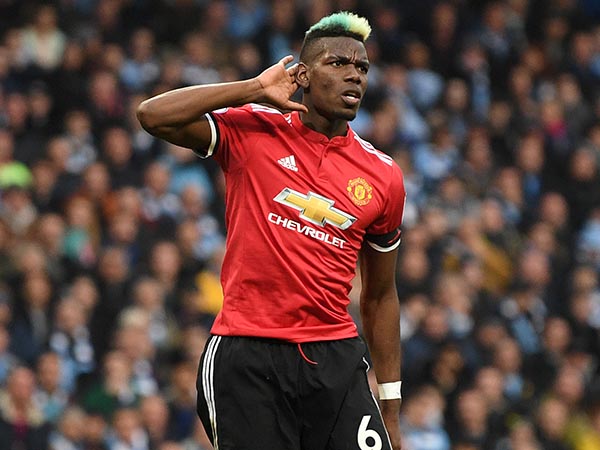 פוגבה עונה לגוארדיולה (Getty)