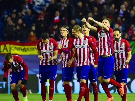 שחקני אתלטיקו חוגגים אחרי הדרמה (Getty)