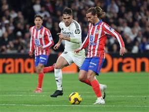 גריזמן במשחק פושר (GETTY)