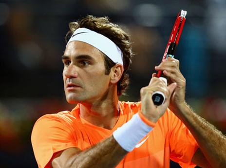 פדרר. שיעור בטניס (Getty)