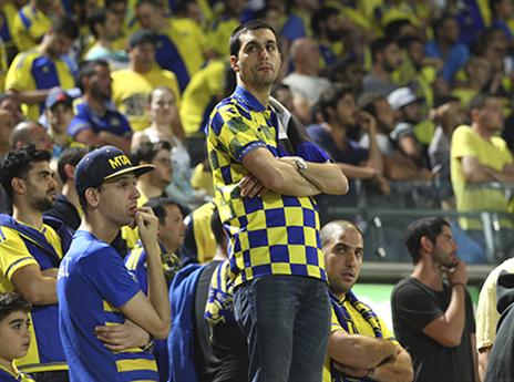 אוהדי מכבי ת"א מנסים לעכל את אובן האליפות