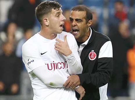 המיקום לא מטריד אותו. לוזון עם רייכרט (צילום: אלן שיבר)