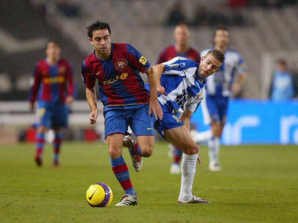 צ'אבי ולואיס גרסיה. ייפגשו לראשונה על הקווים (Bagu Blanco/Getty Images).