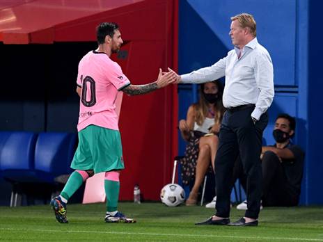 קומאן. מנסה לחבק את מסי (Getty)