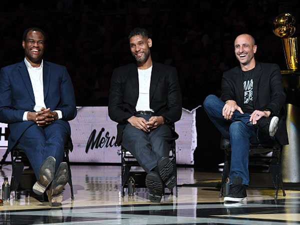 ג'ינובילי לצד דאנקן ורובינסון (Getty)