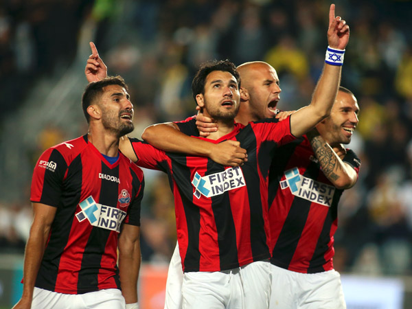 יחזור? שיימן חוגג בגמר הגביע (צילום: אלן שיבר)