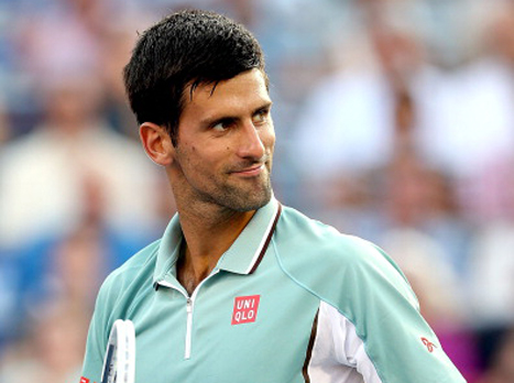 דיוקוביץ'. יחייך גם אחרי חצי הגמר? (GETTYIMAGES)