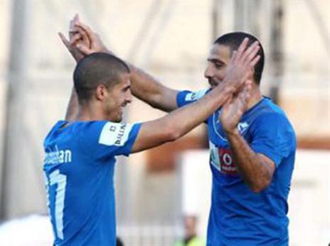 חוגגים בקפריסין. בן שושן עם אוחיון