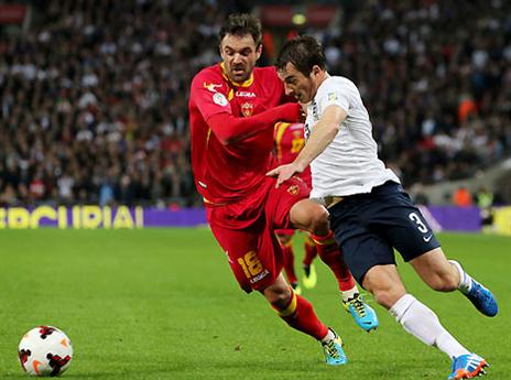 יקבל שחרור מפרטיזן? דרינצ'יץ' מול לייטון ביינס בנבחרת מונטנגרו (gettyimages)