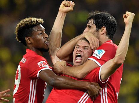 מולר ובאיירן אצל דורטמונד (GETTY)