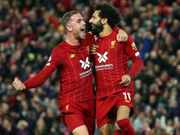 הנדרסון וסלאח חגגו מהפך באנפילד מול טוטנהאם (GETTY)