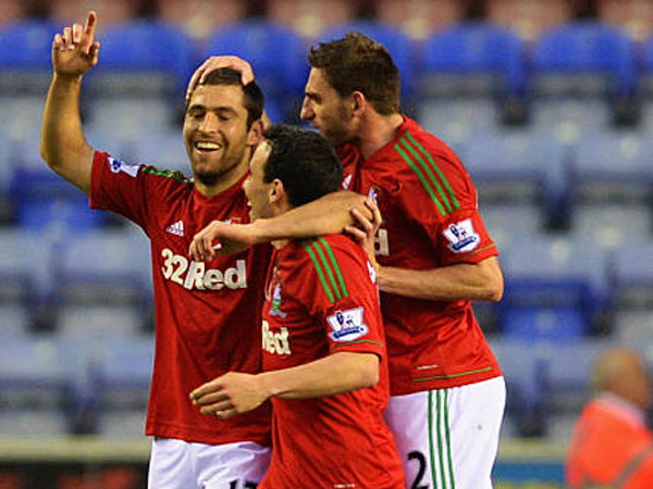 השיג חתימה מפרגוסון. שכטר בסוואנזי (GETTY)