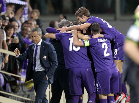 בפסגה. שחקני פיורנטינה וסוזה חוגגים (Getty)