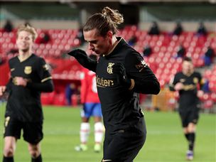 גריזמן להט עם צמד משלו (getty)