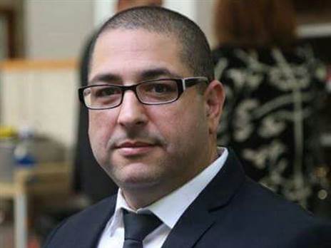 עו"ד עדי כרמלי. מייצג את אחד מבני משפחתו של חוגג