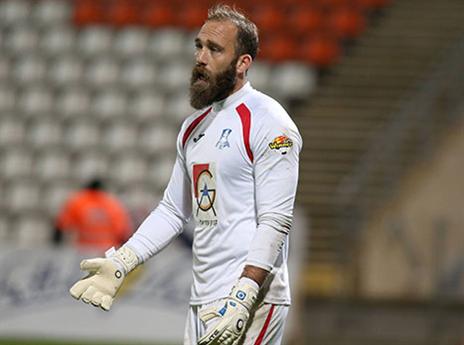 דני עמוס, הגיבור הטראגי של המשחק (יוסי שקל)