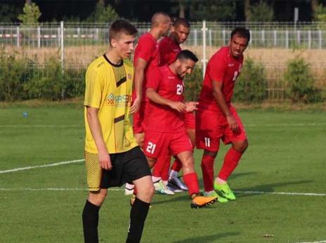 ניצחון במחנה. שחקני הפועל ת"א (האתר הרשמי)