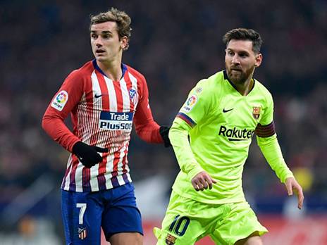 מסי וגריזמן. ישתפו פעולה בעונה הבאה? (OSCAR DEL POZO/AFP/Getty Images)