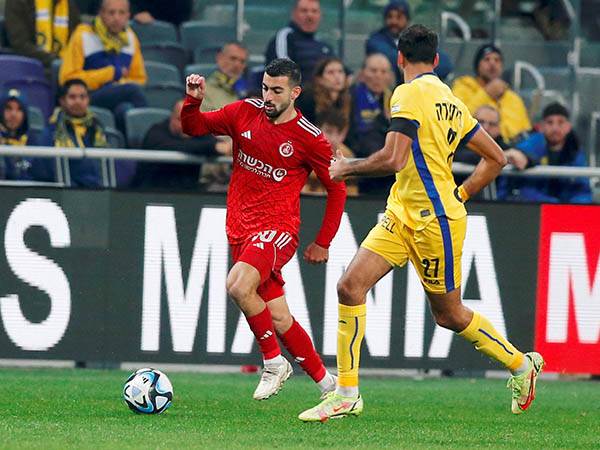 הישאם לאיוס מול מכבי ת“א בדרבי. בעונה הבאה בצהוב? (אלן שיבר)