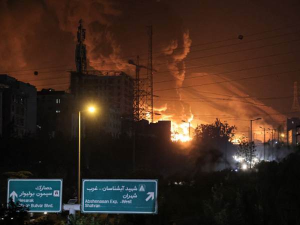 הלהבות בטהרן (GETTY)
