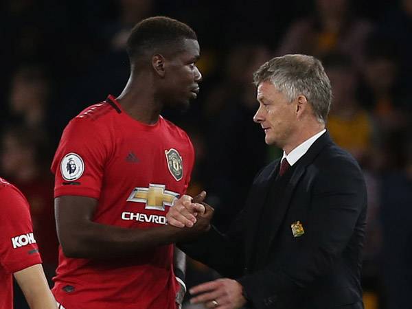 סולשיאר עם פוגבה בסיום. לא ישנה את השיטה (Getty)