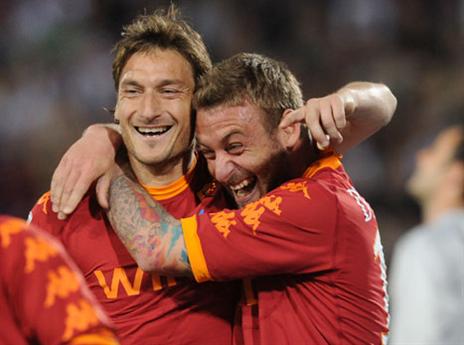 עם דניאלה דה רוסי, סמל אחר של רומא (GETTYIMAGES)