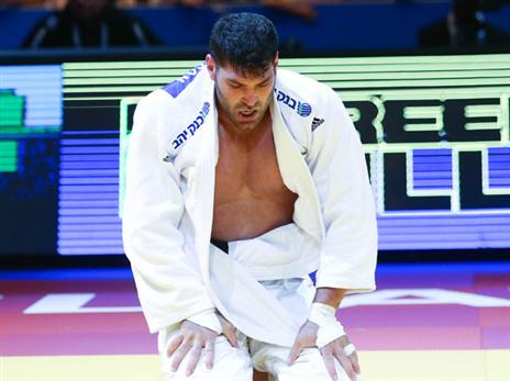 ששון מכוון למדליה (אלן שיבר)