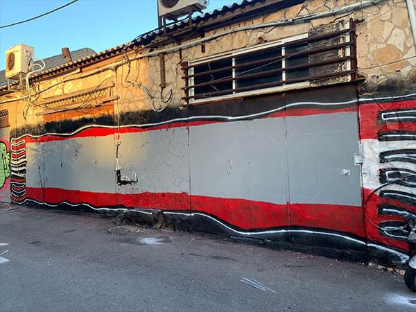 הקיר, לאחר מחיקת הגרפיטי