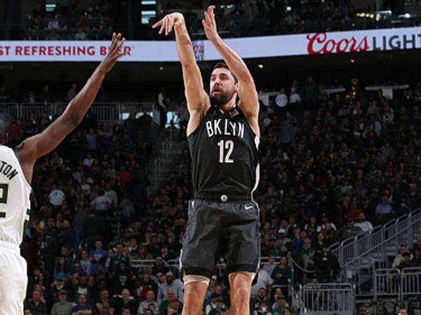 שלשת קלאץ'. האריס (צילום: Gary Dineen/NBAE via Getty Images)