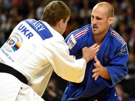 אלן שמידט (מימין). מנוסה על המזרן וכמאמן (Getty)