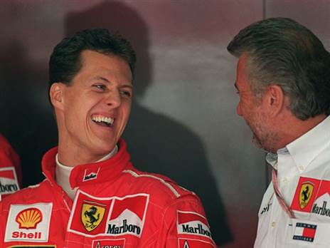 "היה כמו בן בשבילי". שומאכר ו-וובר (GETTY)