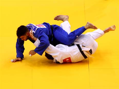 קוכמן בגמר נגד אוזרלר (Getty)