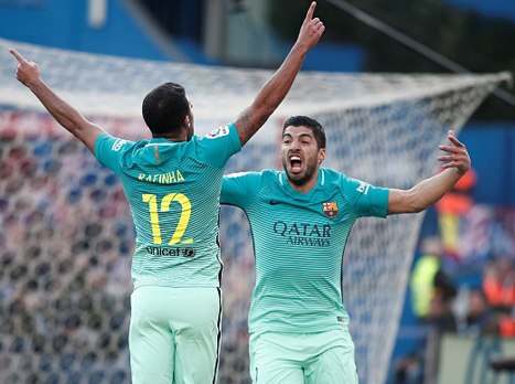 מעל ריאל מדריד. סוארס וראפיניה חוגגים (getty)