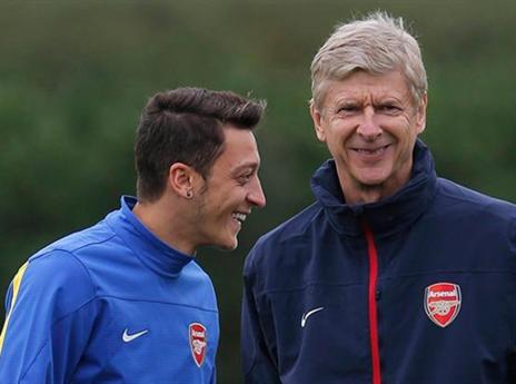 50 מיליון סיבות לאופטימיות. אוזיל עם ונגר (GETTYIMAGES)