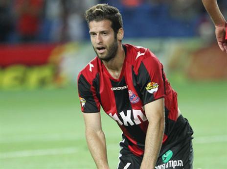 ישחק מול נתניה למרות הפציעה. אוסטוינד (צילום: דני מרון)