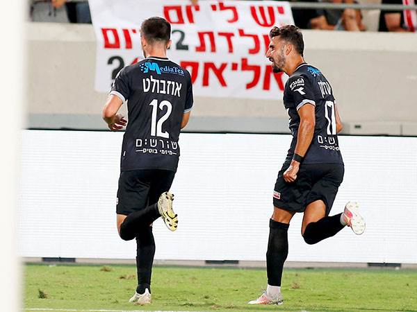 "מקדיש את חיי לכדורגל". אוז'בולט (צילום: אלן שיבר)