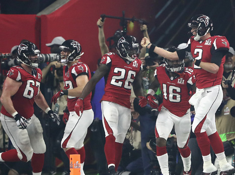 ורץ לחגוג עם הקוורטרבק שלו (Getty)