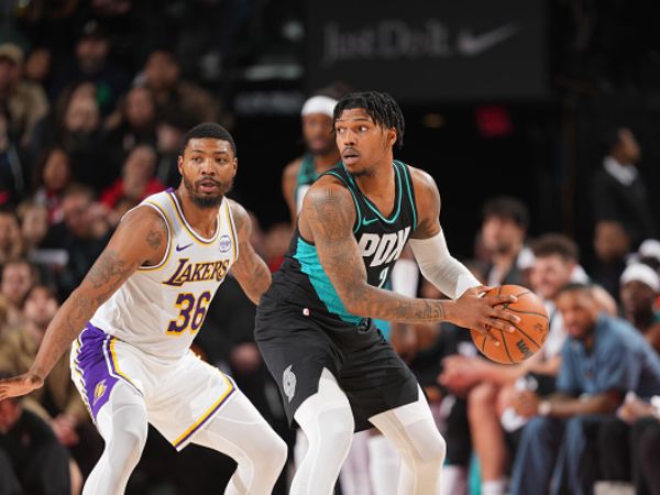 כיילב לאב ומרקוס סמארט. מודלים לחיקוי (Soobum Im/NBAE via Getty Images)