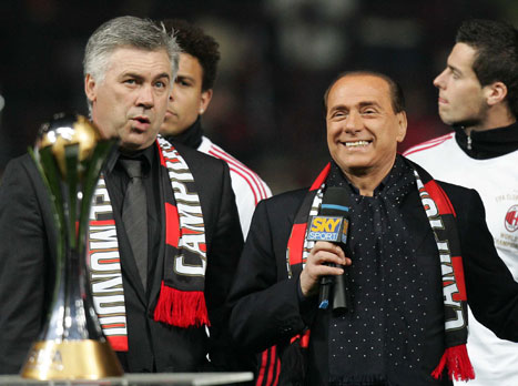 אנצ'לוטי עם ברלוסקוני. גם איתו הוא הסתדר (Getty)