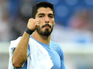 עקיצה אחת הספיקה. סוארס ואורוגוואי בשמינית הגמר, בפעם השלישית ברציפות (getty)